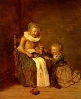 Mit einer Katze spielendes M&auml;dchen